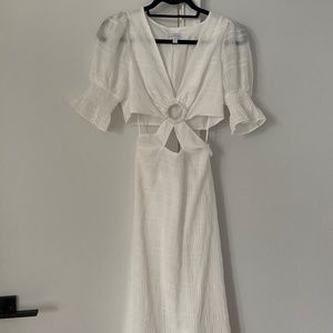 Flowy white dress with cut-outs